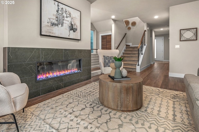 15192 SW Huntwood St, Tigard, OR 97224 - living room featuring wood finished floors, stairs, recessed lighting, and a fireplace