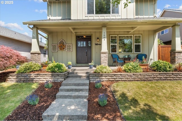 1609 Wood Duck St, Silverton, OR 97381 - view of exterior entry with board and batten siding and covered porch