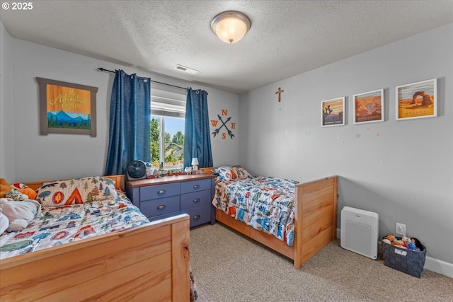 1609 Wood Duck St, Silverton, OR 97381 - bedroom with a textured ceiling and light carpet