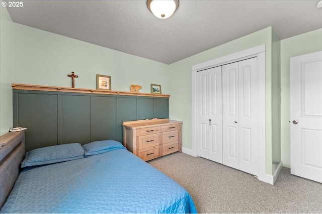 1609 Wood Duck St, Silverton, OR 97381 - bedroom featuring carpet, a closet, and a textured ceiling