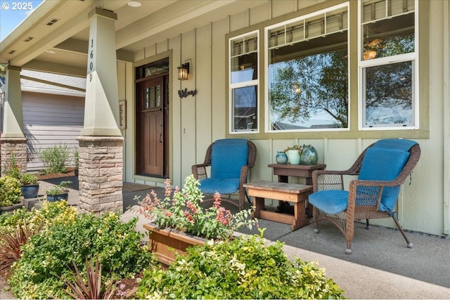 1609 Wood Duck St, Silverton, OR 97381 - doorway to property with covered porch and board and batten siding