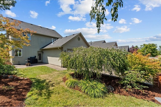 1609 Wood Duck St, Silverton, OR 97381 - view of grassy yard with a patio