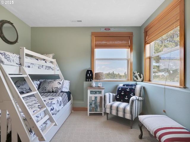 88724 Schroeder Rd, Gearhart, OR 97138 - bedroom featuring multiple windows and baseboards