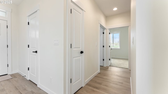 hallway featuring light wood-type flooring