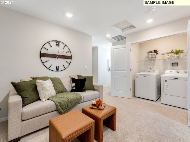 living room with separate washer and dryer and light carpet