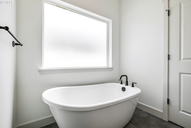 534 Grant St, Umatilla, OR 97882 - bathroom with baseboards and a soaking tub