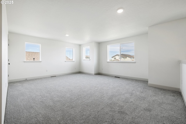 534 Grant St, Umatilla, OR 97882 - carpeted spare room featuring baseboards and recessed lighting