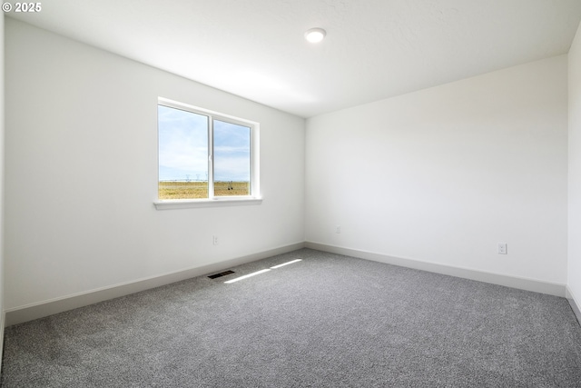 534 Grant St, Umatilla, OR 97882 - carpeted spare room with baseboards