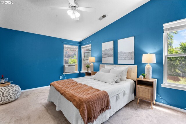 1601 NW 2nd Ave, Battle Ground, WA 98604 - carpeted bedroom featuring vaulted ceiling, multiple windows, baseboards, cooling unit, and a ceiling fan