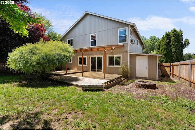 1601 NW 2nd Ave, Battle Ground, WA 98604 - rear view of property with an outdoor fire pit and a deck