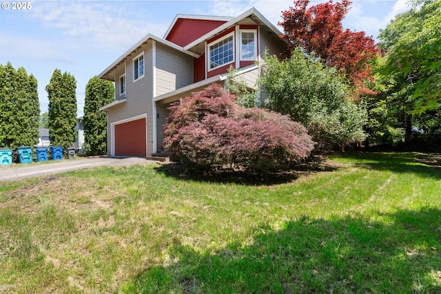 1601 NW 2nd Ave, Battle Ground, WA 98604 - view of home's exterior featuring asphalt driveway, a garage, and a yard