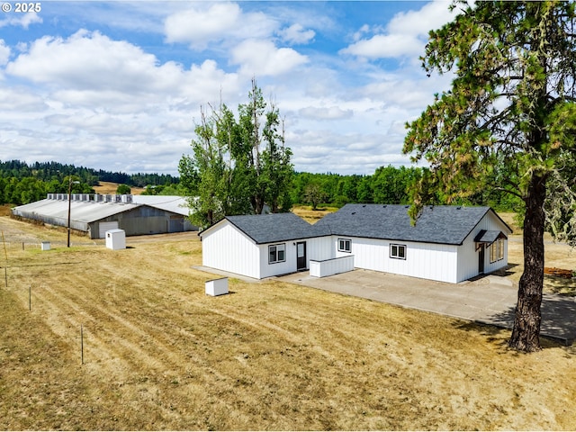 85160 Larson Rd, Eugene, OR 97405 - rear view of house with a patio area and a lawn