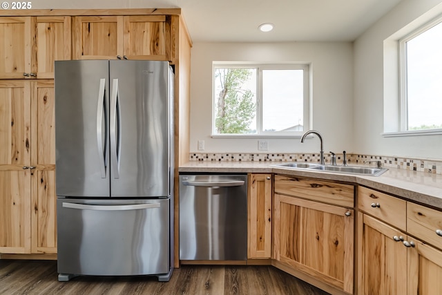 85160 Larson Rd, Eugene, OR 97405 - kitchen with appliances with stainless steel finishes, a sink, dark wood-style floors, backsplash, and recessed lighting