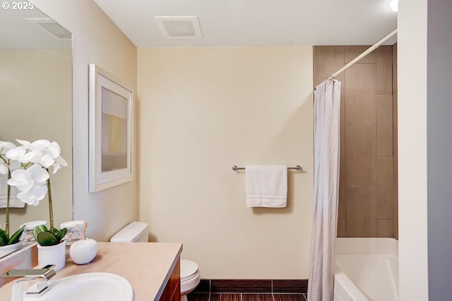 full bathroom with vanity, toilet, and shower / bath combo