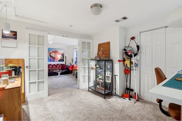 interior space with light colored carpet and french doors