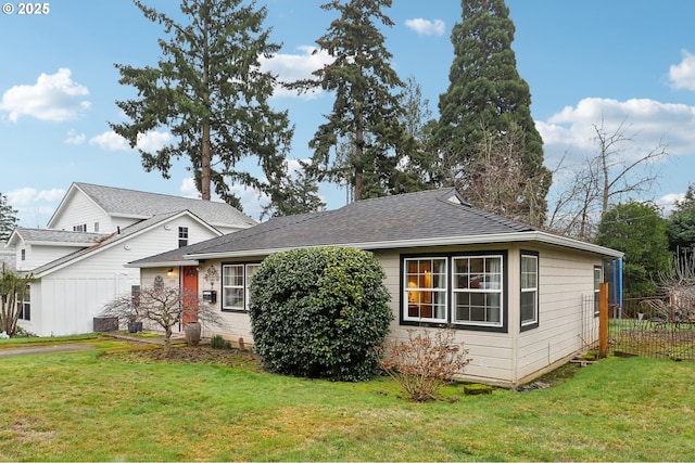 view of front of property with a front lawn