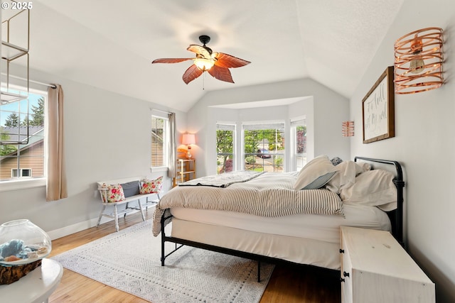 8503 SE 139th Ct, Portland, OR 97236 - bedroom featuring vaulted ceiling, wood finished floors, and a ceiling fan