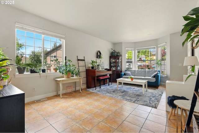 8503 SE 139th Ct, Portland, OR 97236 - living area featuring light tile patterned floors and baseboards
