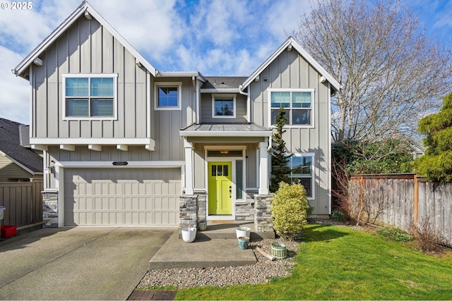 view of front of house featuring a standing seam roof, fence, board and batten siding, concrete driveway, and metal roof