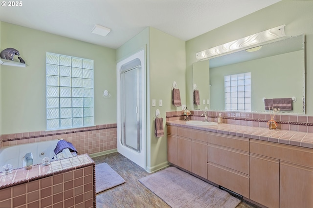 91060 Leashore Dr, Vida, OR 97488 - bathroom featuring plenty of natural light, a tub with jets, vanity, and a shower with shower door