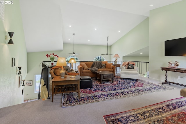 91060 Leashore Dr, Vida, OR 97488 - carpeted living area with high vaulted ceiling, plenty of natural light, recessed lighting, a ceiling fan, and baseboards