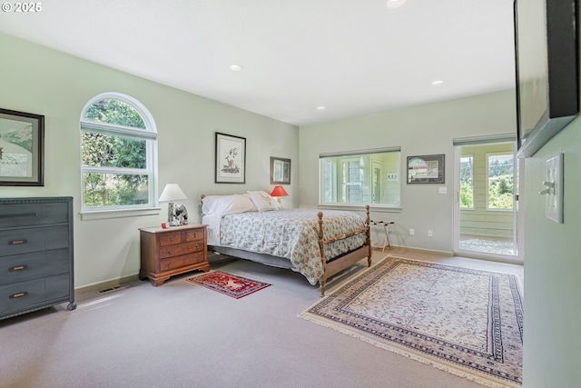 91060 Leashore Dr, Vida, OR 97488 - bedroom featuring multiple windows, baseboards, carpet, and recessed lighting