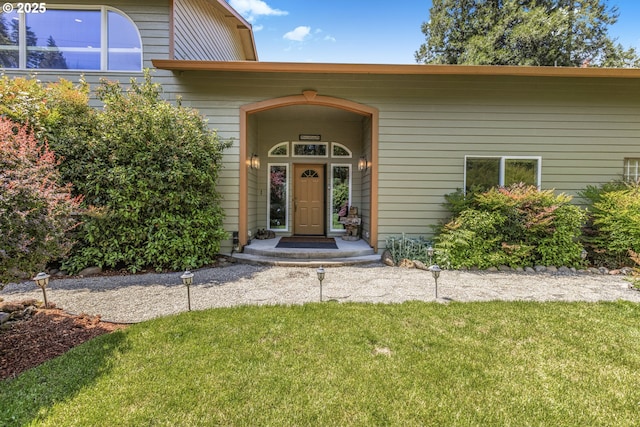 91060 Leashore Dr, Vida, OR 97488 - doorway to property featuring a yard