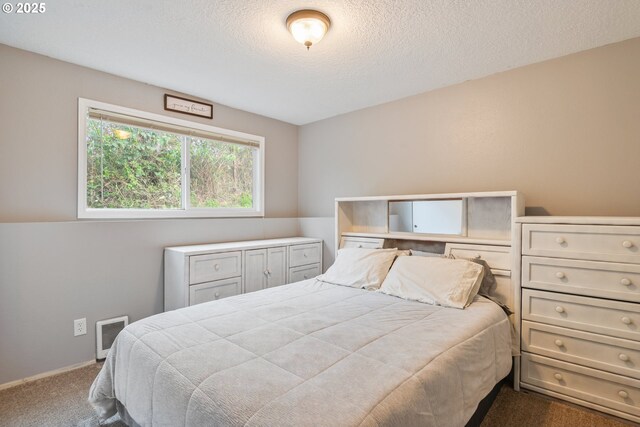 164 Yelton Dr, Longview, WA 98632 - carpeted bedroom with visible vents, a textured ceiling, and baseboards