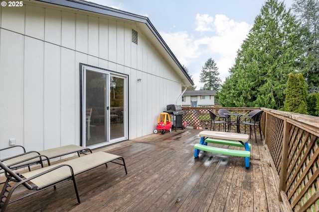 164 Yelton Dr, Longview, WA 98632 - wooden terrace with a grill and outdoor dining area