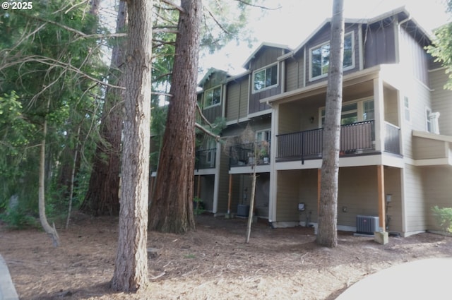 view of building exterior with central AC