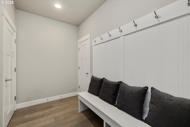 mudroom with recessed lighting, baseboards, and light wood finished floors