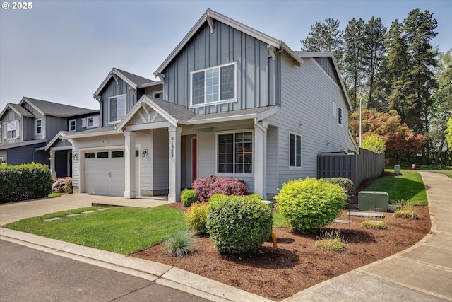 craftsman-style home featuring fence, a front lawn, a garage, board and batten siding, and concrete driveway