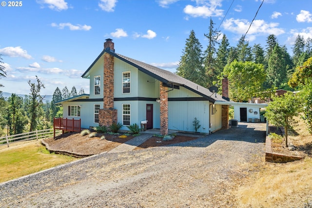 37276 Camp Creek Rd, Springfield, OR 97478 - view of front facade featuring a chimney, gravel driveway, and cooling unit