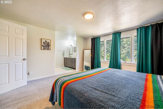 2022 Floral Hill Dr, Eugene, OR 97403 - carpeted bedroom featuring baseboards and a textured ceiling