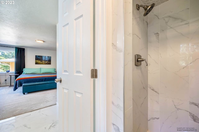 2022 Floral Hill Dr, Eugene, OR 97403 - bedroom featuring carpet flooring, a textured ceiling, baseboards, and ensuite bathroom