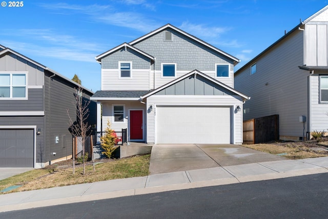 view of front of home with a garage, driveway, and board and batten siding