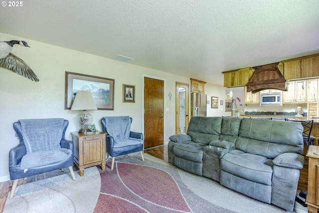 40211 Deerhorn Rd, Springfield, OR 97478 - living area with a textured ceiling and baseboards