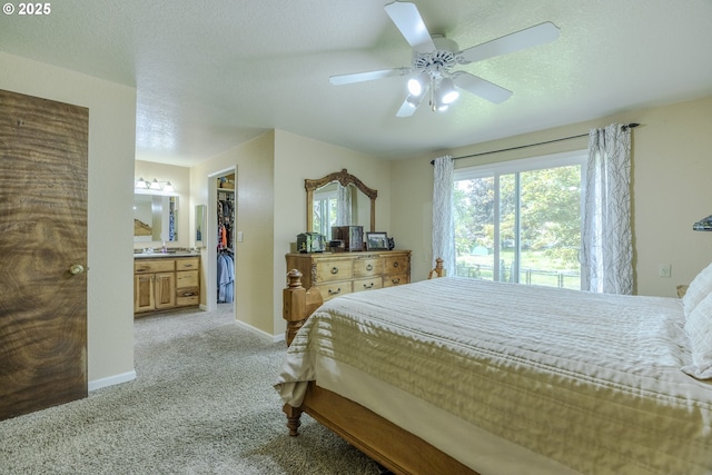 40211 Deerhorn Rd, Springfield, OR 97478 - bedroom featuring light carpet, a spacious closet, a closet, ceiling fan, and baseboards