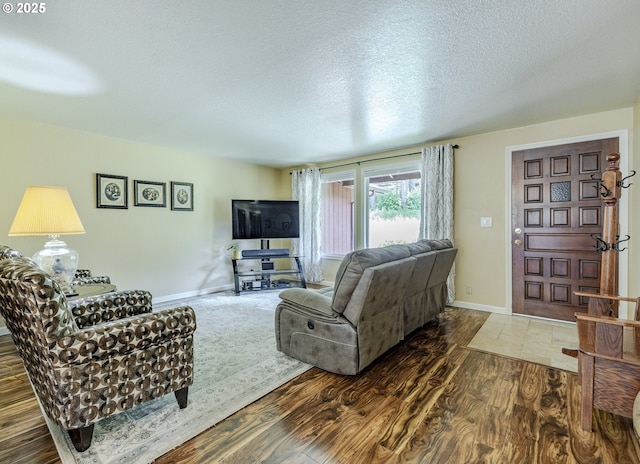 40211 Deerhorn Rd, Springfield, OR 97478 - living room with wood finished floors, a textured ceiling, and baseboards