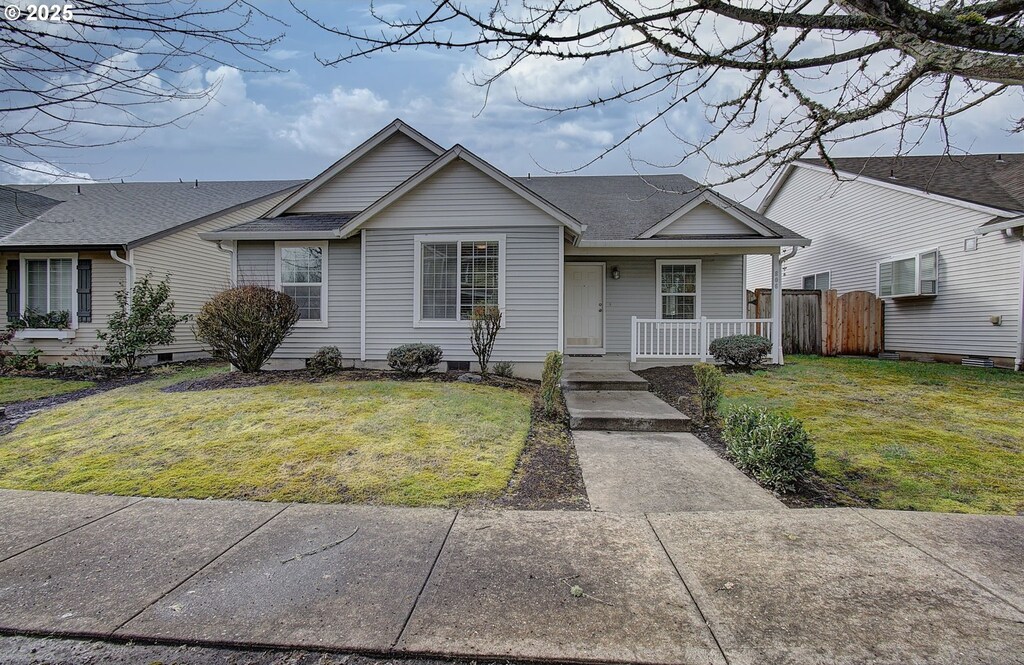 806 NW 15th Ave, Battle Ground, WA 98604 - view of front of house featuring covered porch, a shingled roof, and crawl space