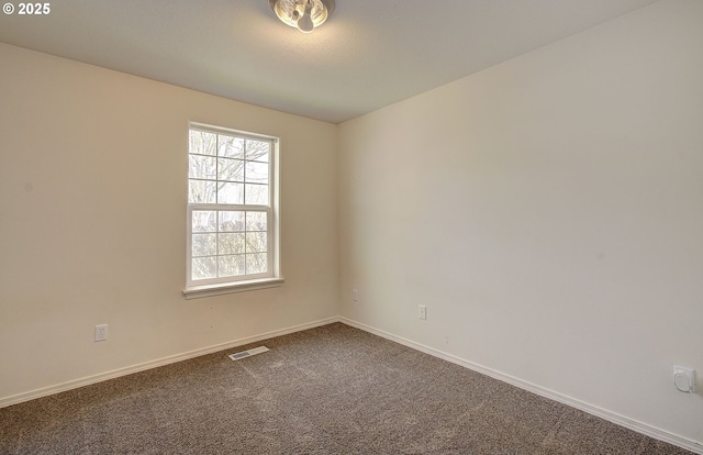 806 NW 15th Ave, Battle Ground, WA 98604 - spare room with baseboards and dark colored carpet