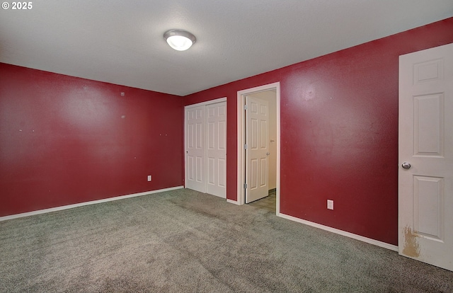 806 NW 15th Ave, Battle Ground, WA 98604 - unfurnished bedroom with carpet, a closet, and baseboards