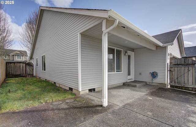 806 NW 15th Ave, Battle Ground, WA 98604 - view of property exterior with a gate and a patio