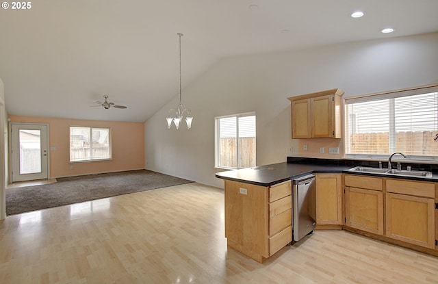 806 NW 15th Ave, Battle Ground, WA 98604 - kitchen featuring dishwasher, a sink, lofted ceiling, light wood-style floors, and a peninsula