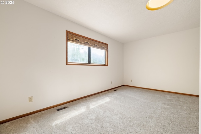 1940 SW 71st Ave, Portland, OR 97225 - carpeted empty room featuring baseboards