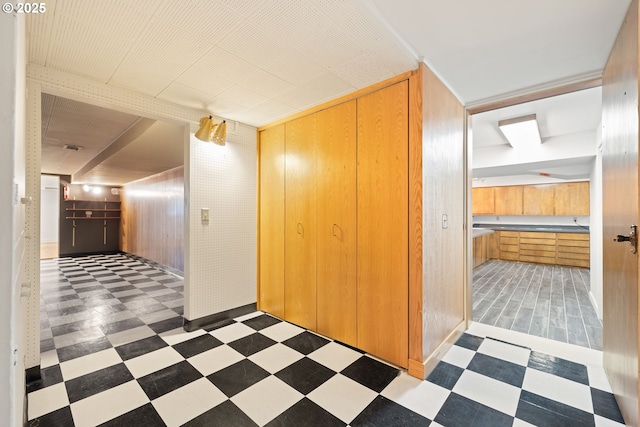 1940 SW 71st Ave, Portland, OR 97225 - corridor featuring light floors and wooden walls