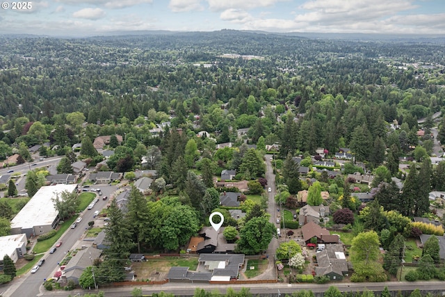 1940 SW 71st Ave, Portland, OR 97225 - aerial overview of property's location featuring a heavily wooded area