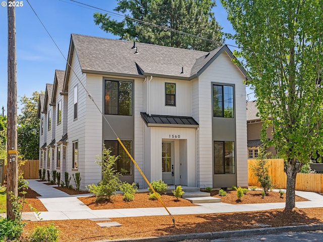 1580 NE 52nd Ave Unit 4, Portland, OR 97213 - view of front of house featuring a standing seam roof, a shingled roof, and metal roof