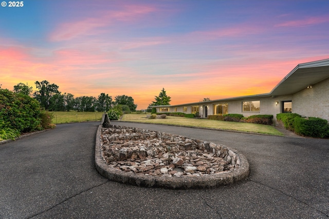 53767 E Honeyman Rd, Scappoose, OR 97056 - view of front facade featuring curved driveway and brick siding