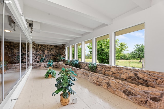 53767 E Honeyman Rd, Scappoose, OR 97056 - unfurnished sunroom with beam ceiling and tile patterned floors